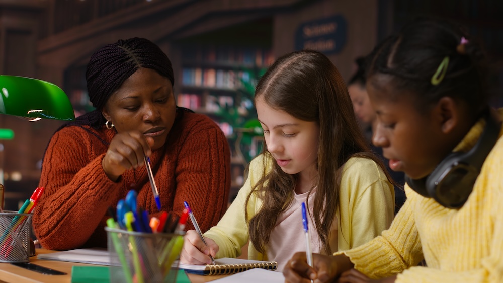 Female teacher assisting pupils with class homework and mentoring, providing academic instruction and support to help pass school assignments. Tutor lecturer gives private lessons. Camera B. SSUCv3H4sIAAAAAAAAA11VTW/tJhD9K5HXQcKA+ci2andPr4vuoi4wjO+lsY2F7aRP0f3vHcC+ye3Gsg+HYc6ZGfzZBN+8NFoOFGw3EGpBEOH9QHo6eAKed4YqqQ23zXPj7QbNS8u5abUSlFJtFD7pc9PbNbjm5bMJ47ivW7JbiHPzgisJZg+pvIIPW0zBjvh1e27WzW77Cituwy+HsS+4Wr7PeK+fGccEf/e7qzFx394j8rP/B9y2Nrfnk/MnxGWEO+FHWB2Mo50h7t9pd0Jz+/u5sReY3a+cwi3nOoItGb02zLYG1Q9Ee6uJ6Dgjtvc9sZr1vVN9qweDofggtbO2J9kKIqRqSc8FJ9QMQmmgRrEBaQO1vYLWEemEJ6JVjGipOWnRdUkZkxI6pFHJWKsExjCDIYIbRzQYT+jAoZPWGzc4pAkmjVdKI656InQvie6pIuBsJ0B56Z1tUNzbxwZpKob+AZNFc1CYkZ0yeXXddg/zlrGWcnqA7hpHmx7BMfTJpl8ZlAyLnrElwQYwVyJFMRm0QwrOzk92gvJSdrSMy7ojDrCuMVVUVjSB9WG+VKxTNGNutOs6YUOsj3ks+xLGO6bpNxX/Z6bwXpr1tdHaUJ6xnC6WOxWqVKwr5/vwjlBhMsqwJuYgW3eFe6ol6EcK21eqUp5+xbFAVBhRTHDWw1Ta9wuc46FGtZxVU8Gm+QyHvGLghFJwCCrKjGZKijYvXPZw2mRarkrMdV+WmLZ6Dm9VxsKM07e7On54mpGtvltaEN3WWl3jBB8xvdWkGO8y2Mf4Vv3BkpaDcSRyUlj+py+tXUel4MUoDBsu83SWQLaqCvawvtVAqOGRWHmanl2RB/kQYYqIK4zLAdCS67Z/udJmBbw6iN00P/jn9oSNt4/7dMBdaRK4Xx/fa7KcllDR1l6Adxjjcs+RHq78lY9/PPu33OK2KmlNdepfW0+lpm4bUdee4LHfjwFbr6FIZFwIw1r+aHUpsznEv+UrunZsd/T2dHC+1aEW5+ms6N1fdw3j4/6DeQnpmCWmMeVzQr5PB16JcStTgJdn3Octn4omCLyDxhgX2+crZbDjClg0dBM5/gBuJVFXilbud/wtxKm+H8NQruItOhR4/ATqL+EaEM1HfTb7MkacJn8s7/0Utu38TPAe4OOLfbvd/gPyfIU/0AYAAA==